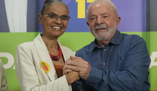 FILE - Brazil&#x27;s former President Luiz Inacio Lula da Silva, right, and congressional candidate Marina Silva, campaign in Sao Paulo, Brazil, Monday, Sept. 12, 2022. Environmentalists, Indigenous people and voters sympathetic to their causes were important to Lula&#x27;s narrow victory over former President Jair Bolsonaro. Now Lula is seeking to fulfill campaign pledges he made to them on a wide range of issues, from expanding Indigenous territories to halting a surge in illegal deforestation. (AP Photo/Andre Penner, file)