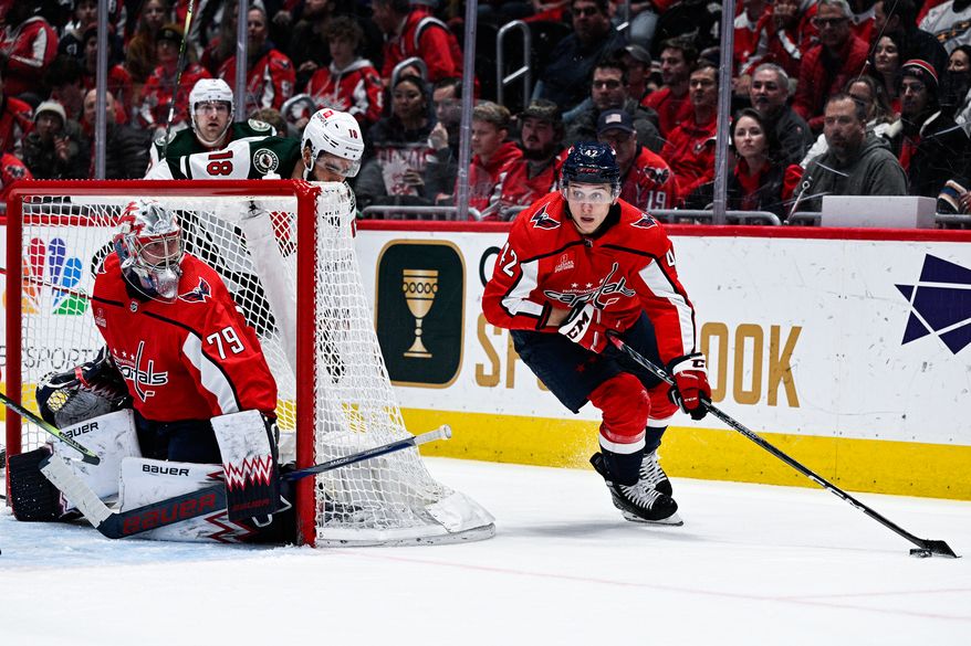 Washington Capitals defenseman Martin Fehervary (42) carries the puck up the ice against the Minnesota Wild at Capital One Arena, Washington, D.C., January 17, 2023. (Photo by Brian Murphy)