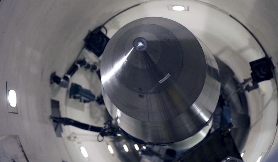 An inert Minuteman III missile is seen in a training launch tube at Minot Air Force Base, N.D., June 25, 2014. (AP Photo/Charlie Riedel, File)