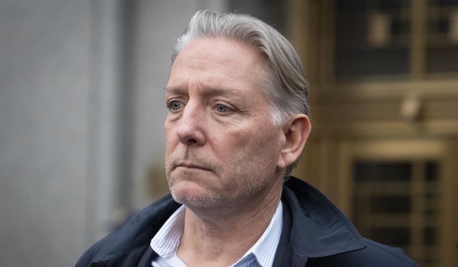 Charles McGonigal, former special agent in charge of the FBI&#x27;s counterintelligence division in New York, leaves court, Monday, Jan. 23, 2023, in New York. The former high-ranking FBI counterintelligence official has been indicted on charges he helped a Russian oligarch, in violation of U.S. sanctions. (AP Photo/John Minchillo) ** FILE **