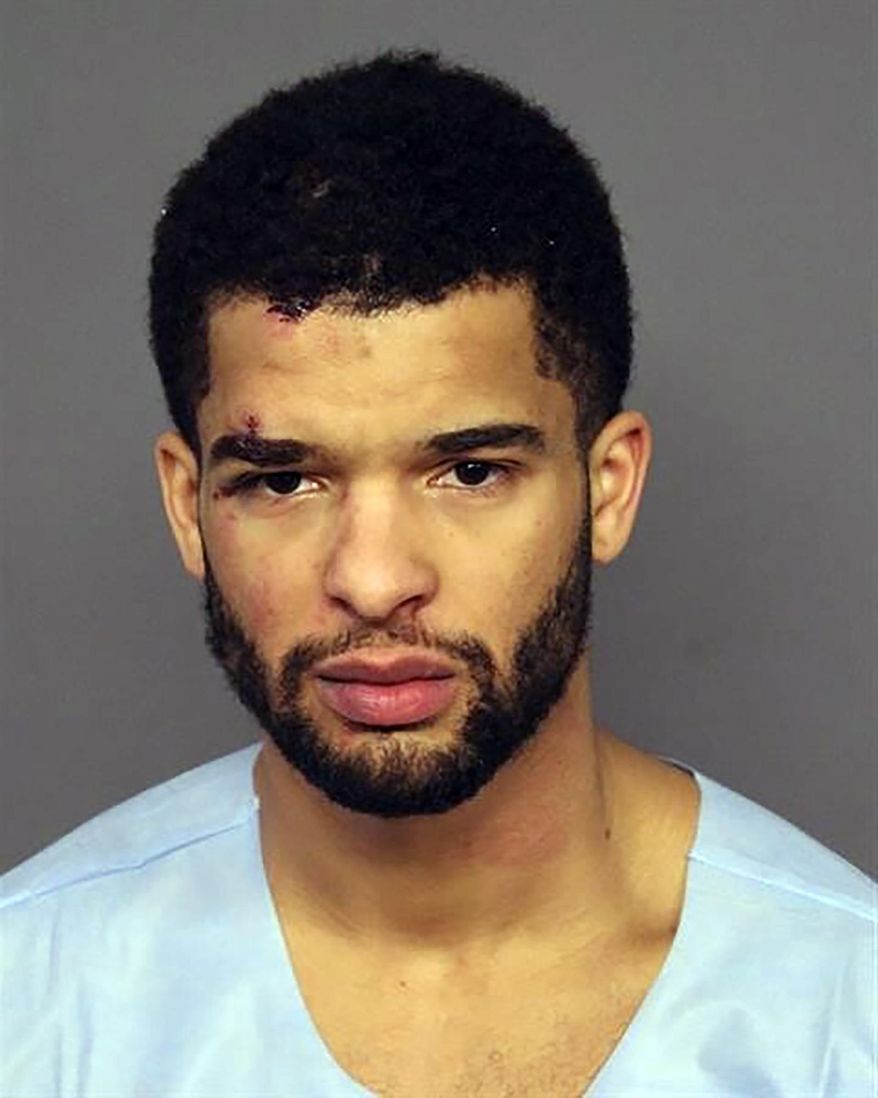 This undated booking photo provided by the Denver Police Department shows Coban Porter. Police say Porter, a University of Denver basketball player, smelled of alcohol and was slurring his speech when he was arrested following a fatal crash in Denver on Sunday, Jan. 22, 2023. (Denver Police Department via AP)