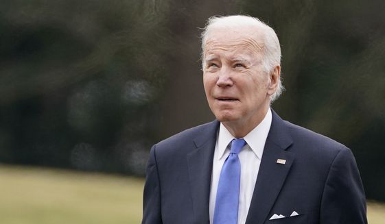 President Joe Biden arrives on the South Lawn of the White House, Monday, Jan. 23, 2023, in Washington. (AP Photo/Evan Vucci)
