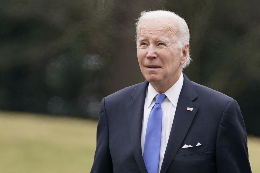 President Joe Biden arrives on the South Lawn of the White House, Monday, Jan. 23, 2023, in Washington. (AP Photo/Evan Vucci)