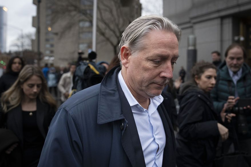 Charles McGonigal, former special agent in charge of the FBI&#x27;s counterintelligence division in New York, leaves court, Monday, Jan. 23, 2023, in New York. The former high-ranking FBI counterintelligence official has been indicted on charges he helped a Russian oligarch, in violation of U.S. sanctions. (AP Photo/John Minchillo)