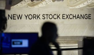 Traders work on the floor at the New York Stock Exchange in New York, Tuesday, Jan. 24, 2023. (AP Photo/Seth Wenig)