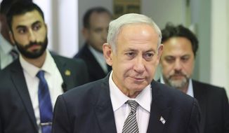 Israeli Prime Minister Benjamin Netanyahu attends a hearing at the Magistrate&#x27;s Court in Rishon LeZion, Israel, Monday, Jan. 23, 2023. Netanyahu has made a surprise trip to Jordan to meet with King Abdullah II. Tuesday, Jan 24. (Abir Sultan/Pool Photo via AP)