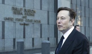 Elon Musk departs the Phillip Burton Federal Building and United States Court House in San Francisco, on Tuesday, Jan. 24, 2023. (AP Photo/ Benjamin Fanjoy) **FILE**