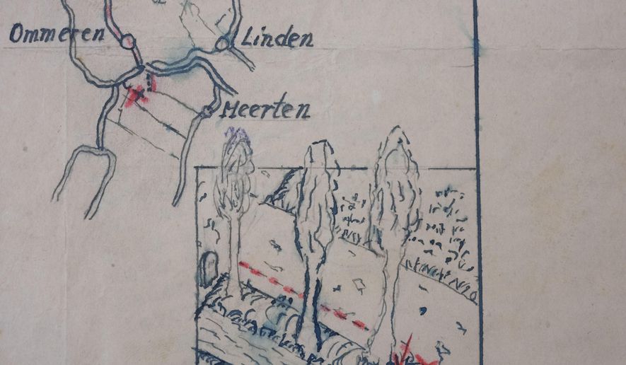 A detail of the map showing where the Nazi loot was reportedly buried in Ommeren, near Arnhem, is seen at the National Archive of the Netherlands in The Hague, Monday, Jan. 23, 2023. A hand-drawn map with a red letter X purportedly showing the location of a buried stash of precious jewellery looted by Nazis from a blown-up bank vault has sparked a modern-day treasure hunt in a tiny Dutch village. (AP Photo/Peter Dejong)