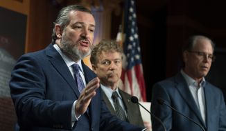 Sen. Ted Cruz, R-Texas, from left, with Sens. Rand Paul, R-Ky., and Mike Braun, R-Ind., talks about debt ceiling during a news conference on Capitol Hill in Washington, Wednesday, Jan. 25, 2023. (AP Photo/Manuel Balce Ceneta)