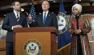 Rep. Adam Schiff, D-Calif., center, with Rep. Eric Swalwell, D-Calif., left, and Rep. Ilhan Omar, D-Minn., speaks during a news conference on Capitol Hill in Washington, Wednesday, Jan. 25, 2023, in Washington. Minority Leader Hakeem Jeffries of N.Y., has nominated the two California lawmakers for the Intelligence Committee in open defiance of House Speaker Kevin McCarthy&#39;s vow to block them. Jeffries asked that Schiff and Swalwell be reappointed to the Intelligence panel. (AP Photo/Manuel Balce Ceneta)