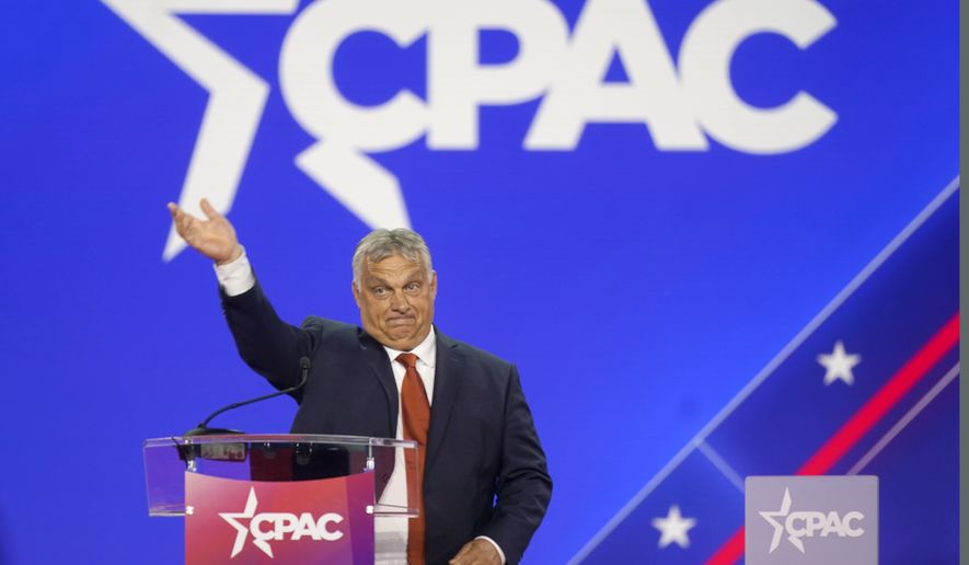 Hungarian Prime Minister Viktor Orban waves has he walks onto stage to speak at the Conservative Political Action Conference (CPAC) in Dallas, on Aug. 4, 2022. For the second year running, Hungary will host a conference in May of mainly U.S. and European conservatives as its right-wing populist government, largely isolated in Europe, seeks allies with like-minded movements further afield. The American Conservative Political Action Conference, or CPAC, will host its second event in Europe under the motto “Together we are strong,” according to a statement from the conference organizer released on Monday. (AP Photo/LM Otero)