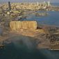 A drone picture shows the scene of an explosion that hit the seaport of Beirut, on Aug. 5, 2020. Lebanon’s top prosecutor Wednesday Jan. 25, 2023 ordered all suspects detained in the deadly 2020 port blast released, a lawyer for two detainees and judicial officials said. (AP Photo/Hussein Malla, File)