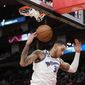 Washington Wizards&#39; Kyle Kuzma dunks the ball during the second half of an NBA basketball game against the Houston Rockets Wednesday, Jan. 25, 2023, in Houston. The Wizards won 108-103. (AP Photo/David J. Phillip)
