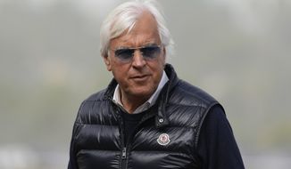 Trainer Bob Baffert waits for the Breeders&#39; Cup horse races at Del Mar racetrack in Del Mar, Calif., Nov. 5, 2021. Baffert can once again enter horses at New York’s major tracks. The Hall of Fame trainer’s one-year ban by the New York Racing Association ended Wednesday, Jan. 25, 2023, allowing him to enter horses as soon as Thursday, Jan. 26. (AP Photo/Jae C. Hong, File)