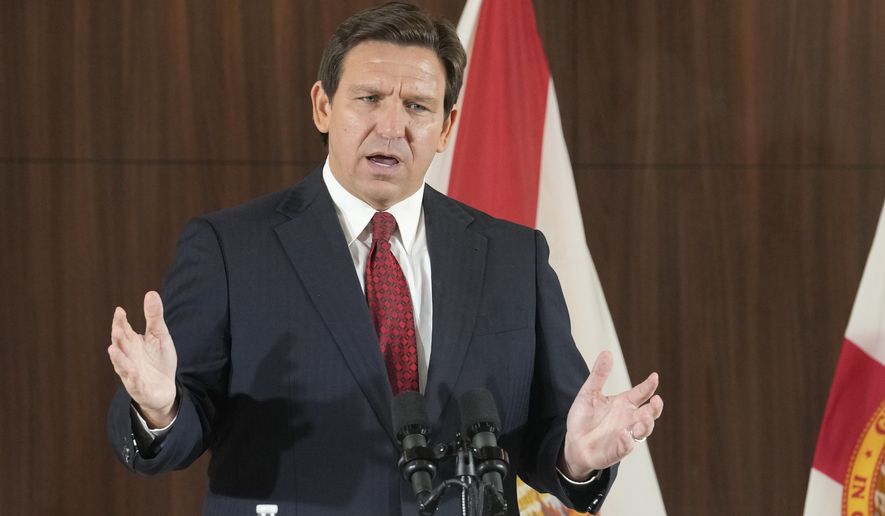 Florida Gov. Ron DeSantis gestures during a news conference on Thursday, Jan. 26, 2023, in Miami, where he spoke of new law enforcement legislation that will be introduced during the upcoming session. (AP Photo/Marta Lavandier) **FILE**