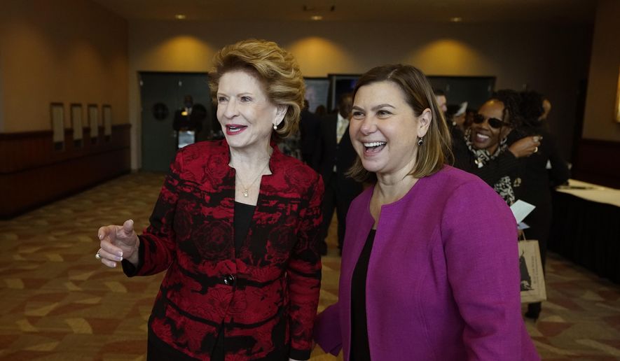 Sen. Debbie Stabenow, D-Mich., left, talks with Rep. Elissa Slotkin, Monday, Jan. 16, 2023, in Lansing, Mich. Rep. Slotkin is taking steps toward seeking the U.S. Senate seat held by Stabenow who is retiring. Slotkin has quickly shifted from fighting for her political life in the nation&#x27;s third most-expensive U.S. House race last year to &quot;at the very top&quot; of the Michigan Democrats readying for a 2024 Senate campaign. (AP Photo/Carlos Osorio)