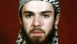 American John Walker Lindh is seen in this undated photo obtained Tuesday, Jan. 22, 2002, from a religious school where he studied for five months in Bannu, 304 kilometers (190 miles) southwest of Islamabad, Pakistan. Lindh, convicted nearly a decade ago of supporting the Islamic State as a teenager has now been accused of violating his terms of release by meeting with convicted Taliban supporter John Walker Lindh. (AP Photo, File)
