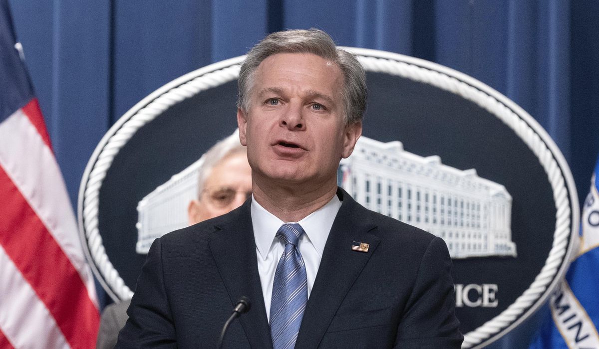 NextImg:Wray says FBI assessed long ago that COVID-19 was likely caused by China lab leak