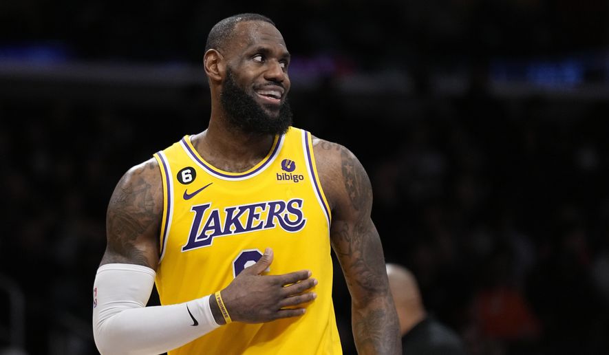 Los Angeles Lakers forward LeBron James smiles during the second half of an NBA basketball game against the San Antonio Spurs Wednesday, Jan. 25, 2023, in Los Angeles. (AP Photo/Mark J. Terrill)