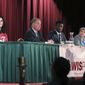 FILE - From left, Wisconsin state Supreme Court candidates Waukesha County Judge Jennifer Dorow, former Wisconsin Supreme Court Justice Dan Kelly, Dane County Judge Everett Mitchell, and Milwaukee County Judge Janet Protasiewicz participate in a candidate forum at Monona Terrace in Madison, Wis. Monday, Jan. 9, 2023. The winner of the April 4 election will determine whether the court remains under control of conservative justices or flips to a liberal majority. (John Hart/Wisconsin State Journal via AP, File)