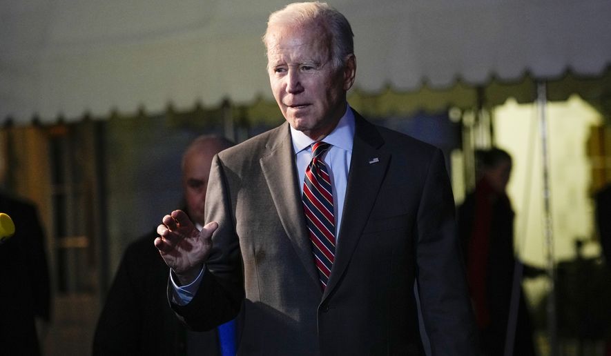 President Joe Biden speaks to reporters before boarding Marine One on the South Lawn of the White House in Washington, Friday, Jan. 27, 2023, as he heads to Camp David. (AP Photo/Susan Walsh) **FILE**