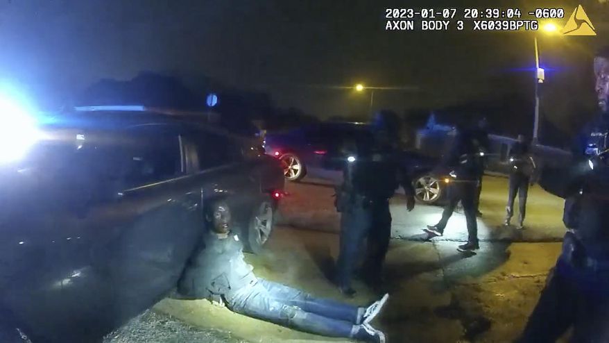 The image from video released on Jan. 27, 2023, by the City of Memphis, shows Tyre Nichols leaning against a car after a brutal attack by five Memphis police officers on Jan. 7, 2023, in Memphis, Tenn. Nichols died on Jan. 10. The five officers have since been fired and charged with second-degree murder and other offenses. (City of Memphis via AP)