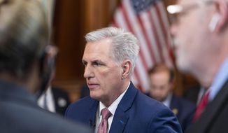 FILE - House Speaker Kevin McCarthy of Calif., pauses during a break in the taping of an interview for the Hannity show with Fox News Channel&#39;s Sean Hannity, on Capitol Hill, Jan. 10, 2023, in Washington. (AP Photo/Alex Brandon, File)