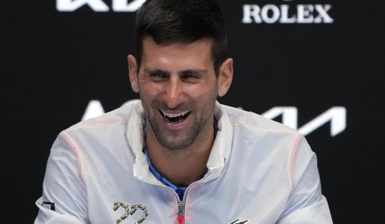 Novak Djokovic of Serbia reacts during a press conference following his win over Stefanos Tsitsipas of Greece in the men&#x27;s singles final at the Australian Open tennis championship in Melbourne, Australia, early Monday, Jan. 30, 2023. (AP Photo/Dita Alangkara)