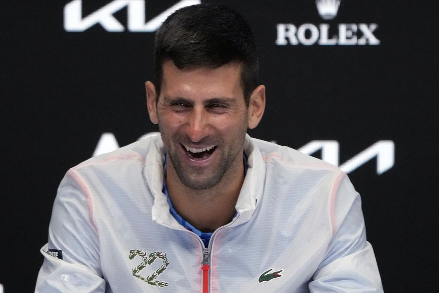 Novak Djokovic of Serbia reacts during a press conference following his win over Stefanos Tsitsipas of Greece in the men&#x27;s singles final at the Australian Open tennis championship in Melbourne, Australia, early Monday, Jan. 30, 2023. (AP Photo/Dita Alangkara)
