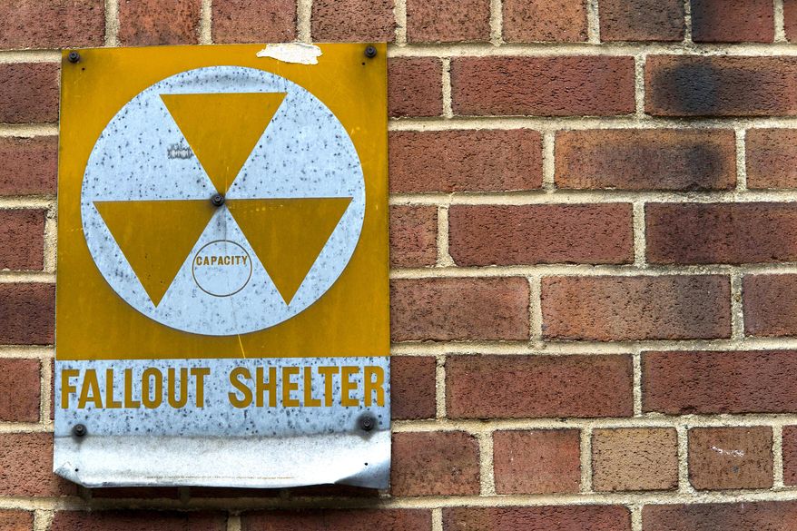 A fallout shelter sign hangs on a building on East 9th Street in New York on Jan. 16, 2018. (AP Photo/Mary Altaffer)