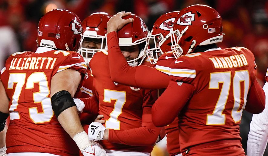 Kansas City Chiefs place kicker Harrison Butker (7) celebrates with teammates after his game winning field goal against the Cincinnati Bengals during the second half of the NFL AFC Championship playoff football game, Sunday, Jan. 29, 2023, in Kansas City, Mo. The Chiefs won 23-20. (AP Photo/Charlie Riedel)