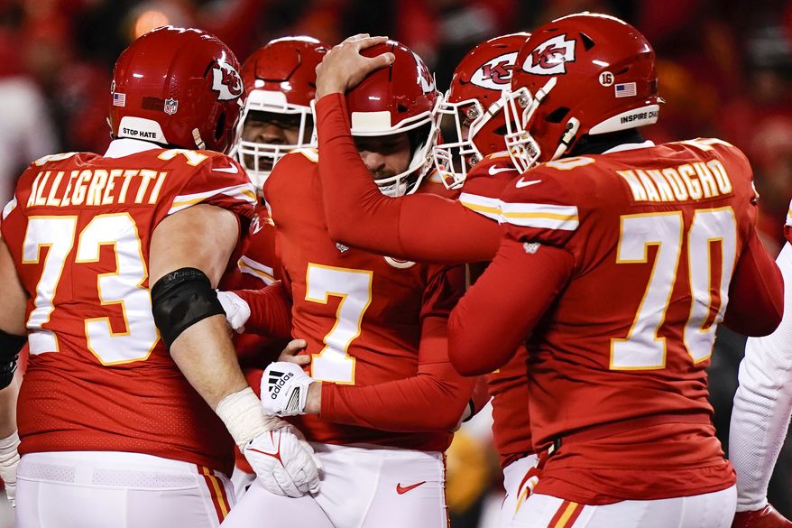 Kansas City Chiefs place kicker Harrison Butker (7) celebrates with teammates after his game winning field goal against the Cincinnati Bengals during the second half of the NFL AFC Championship playoff football game, Sunday, Jan. 29, 2023, in Kansas City, Mo. The Chiefs won 23-20. (AP Photo/Charlie Riedel)