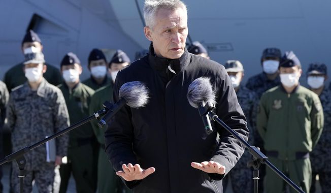 NATO Secretary-General Jens Stoltenberg delivers a speech to personnel of Japan Self-Defense Forces at Iruma Air Base in Sayama, northwest of Tokyo, Tuesday, Jan. 31, 2023. (AP Photo/Eugene Hoshiko)