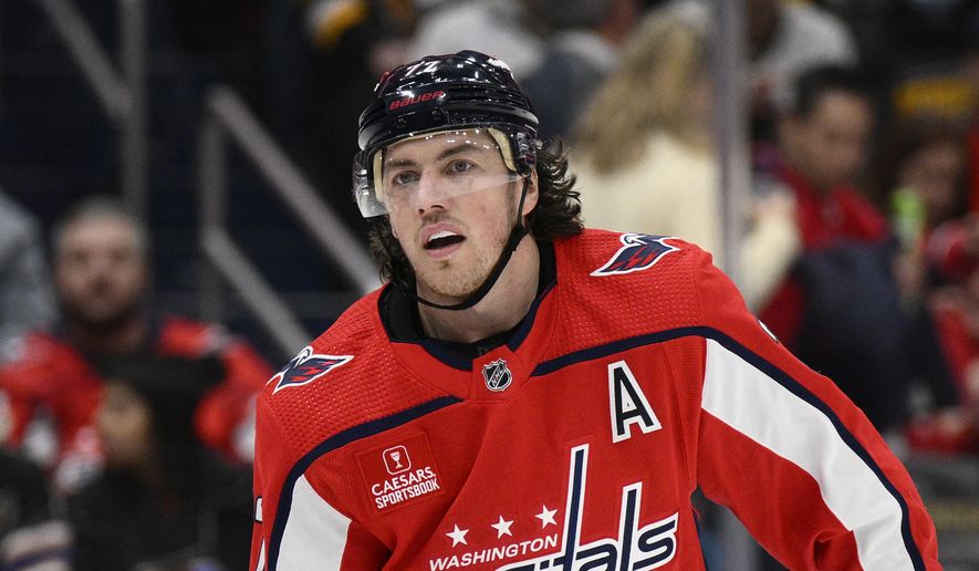 Washington Capitals right wing T.J. Oshie (77) looks on during the second period of an NHL hockey game against the Pittsburgh Penguins, Thursday, Jan. 26, 2023, in Washington. (AP Photo/Nick Wass)