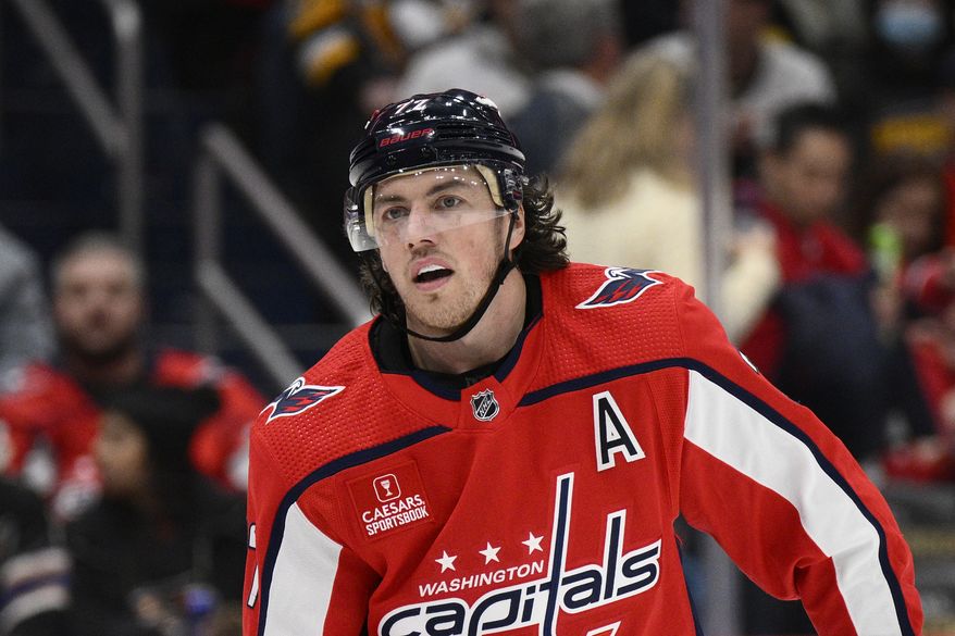 Washington Capitals right wing T.J. Oshie (77) looks on during the second period of an NHL hockey game against the Pittsburgh Penguins, Thursday, Jan. 26, 2023, in Washington. (AP Photo/Nick Wass)