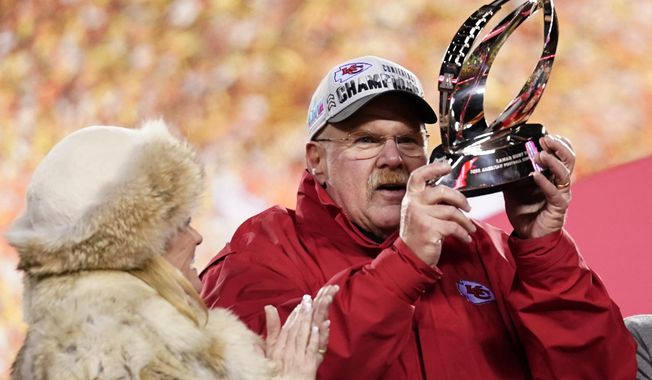 Kansas City Chiefs head coach Andy Reid holds the Lamar Hunt Trophy after the NFL AFC Championship playoff football game against the Cincinnati Bengals, Sunday, Jan. 29, 2023, in Kansas City, Mo. The Chiefs won 23-20. (AP Photo/Brynn Anderson) **FILE**