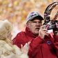 Kansas City Chiefs head coach Andy Reid holds the Lamar Hunt Trophy after the NFL AFC Championship playoff football game against the Cincinnati Bengals, Sunday, Jan. 29, 2023, in Kansas City, Mo. The Chiefs won 23-20. (AP Photo/Brynn Anderson) **FILE**