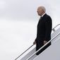 President Joe Biden walks down the steps of Air Force One at John F. Kennedy International Airport, in New York, Tuesday, Jan. 31, 2023, as he heads to the construction site of the Hudson Tunnel Project. (AP Photo/Susan Walsh)