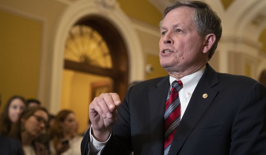 Sen. Steve Daines, R-Mont., speaks to reporters following the Republican policy luncheon meeting on Capitol Hill, Tuesday, Jan. 31, 2023, in Washington. (AP Photo/Manuel Balce Ceneta)