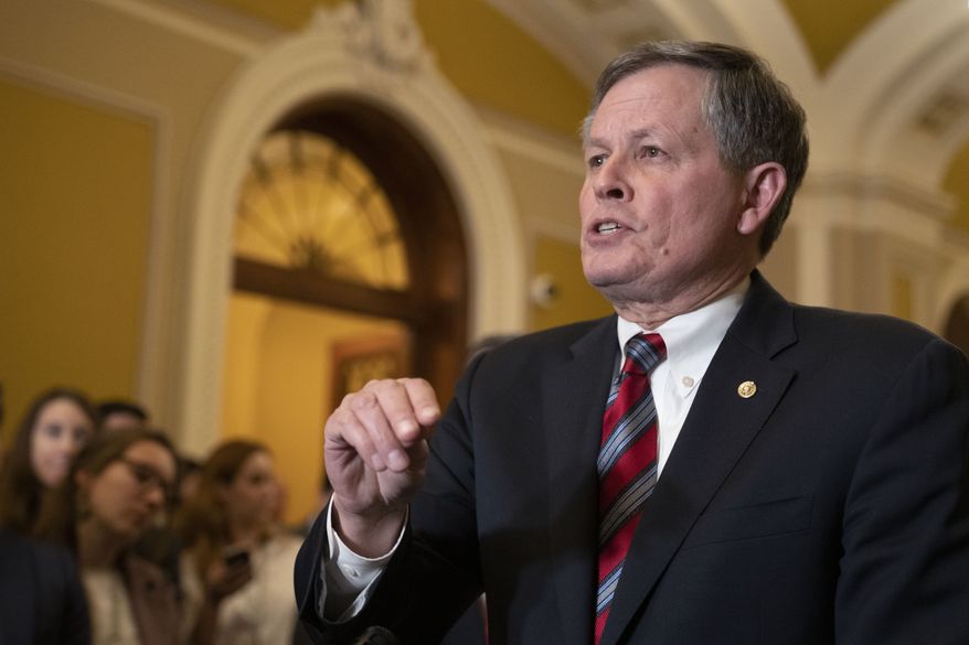 Sen. Steve Daines, R-Mont., speaks to reporters following the Republican policy luncheon meeting on Capitol Hill, Tuesday, Jan. 31, 2023, in Washington. (AP Photo/Manuel Balce Ceneta)