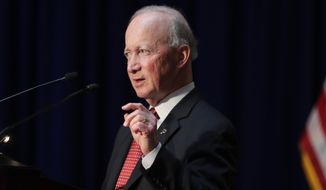 Former Indiana Gov. Mitch Daniels, president of Purdue University, delivers remarks to hundreds of mourners gathered at a memorial service honoring former U.S. Sen. Birch Bayh at the Indiana Statehouse in Indianapolis, May 1, 2019. Daniels announced Tuesday, Jan. 31, 2023, that he wouldn’t seek that state’s open U.S. Senate seat next year, ending weeks of speculation about whether the longtime Republican figure would enter a possibly vicious GOP primary fight with a combative defender of former President Donald Trump. (AP Photo/Michael Conroy, File)