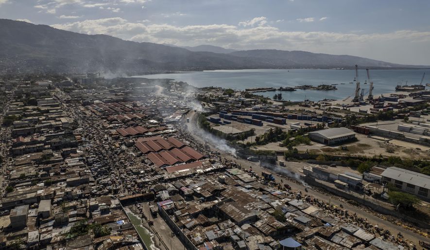 Aerial view of La Saline district in Port-au-Prince, Haiti, Tuesday, Jan. 24, 2023. In December, the U.N. estimated that gangs controlled 60% of Haiti’s capital, but nowadays most on the streets of Port-au-Prince say that number is closer to 100%. (AP Photo/Fernanda Pesce)