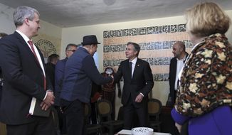 U.S. Secretary of State Antony Blinken, center, meets representatives of the Palestinian civil society in Ramallah in the occupied West Bank, on Tuesday, Jan. 31, 2023. Blinken is wrapping up a two-day visit to Israel and the West Bank with renewed appeals for Israeli-Palestinian calm amid an alarming spike of violence. (Ronaldo Schemidt/Pool Photo via AP)