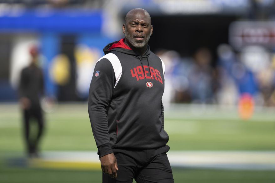 San Francisco 49ers assistant head coach Anthony Lynn walks on the field during an NFL football game against the Los Angeles Rams on Oct. 30, 2022, in Inglewood, Calif. The Washington Commanders said Wednesday, Feb. 1, 2023, that they are interviewing Lynn for their offensive coordinator vacancy. (AP Photo/Kyusung Gong, File) **FILE**