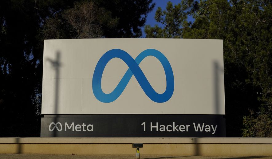 Meta&#x27;s logo can be seen on a sign at the company&#x27;s headquarters in Menlo Park, Calif., on Nov. 9, 2022.  Meta reports their earnings on Wednesday, Feb. 1, 2023. (AP Photo/Godofredo A. Vásquez, File)