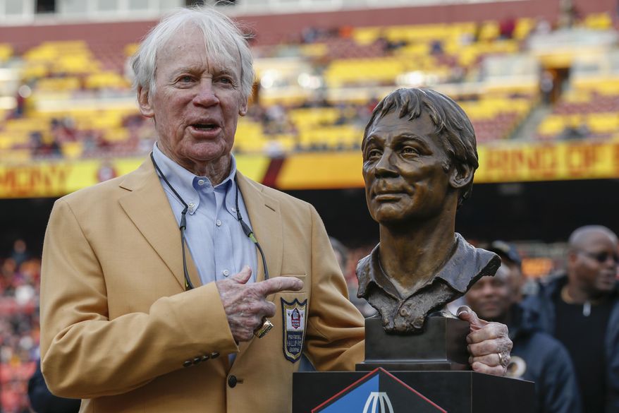 FILE - Former Washington Redskins general manager Bobby Beathard poses with his Hall of Fame trophy during halftime of an NFL football game between the Houston Texans and the Washington Redskins, Nov. 18, 2018 in Landover, Md. The four-time Super Bowl winning executive has died. He was 86. A spokesperson for the Washington Commanders said Beathard&#x27;s family told the team he died earlier this week at his home in Franklin, Tennessee. (AP Photo/Alex Brandon, file)