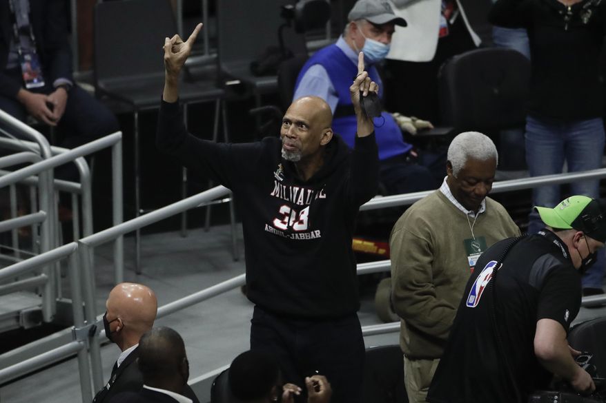 Kareem Abdul-Jabbar reacts during the first half of Game 4 of basketball&#x27;s NBA Finals between the Milwaukee Bucks and the Phoenix Suns, Wednesday, July 14, 2021, in Milwaukee. Kareem Abdul-Jabbar&#x27;s reign atop the NBA career scoring list is about to end after nearly four decades. LeBron James is on the verge of passing Abdul-Jabbar for the record that he&#x27;s held since 1984.(AP Photo/Aaron Gash, File) **FILE**
