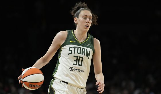 Seattle Storm forward Breanna Stewart brings the ball up against the Las Vegas Aces in Game 2 of a WNBA basketball playoff semifinal Aug. 31, 2022, in Las Vegas.Stewart is the biggest WNBA free agent on the market this offseason and the former MVP has a host of teams courting her, including the Storm, where she&#x27;s spent her entire career. (AP Photo/John Locher, File) **FILE**