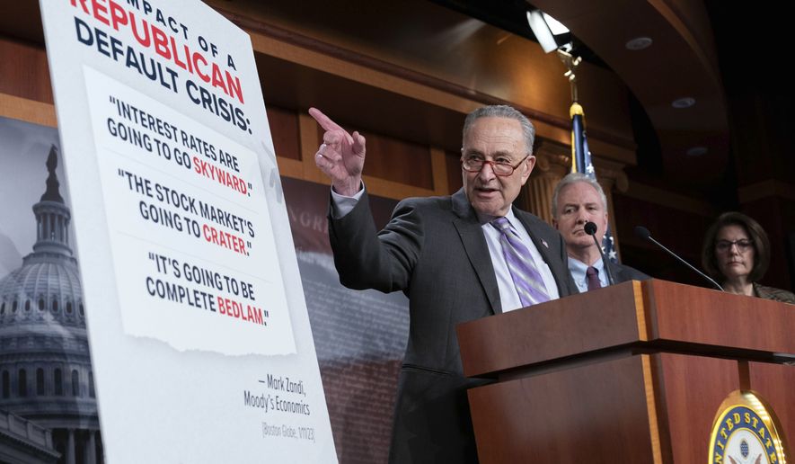 Senate Majority Leader Chuck Schumer, D-N.Y. flanked by Sen. Chris Van Hollen D-Md., and Sen. Catherine Cortez Masto, D-Nev., speaks during a news conference at the Capitol in Washington, Thursday, Feb. 2, 2023. (AP Photo/Jose Luis Magana)