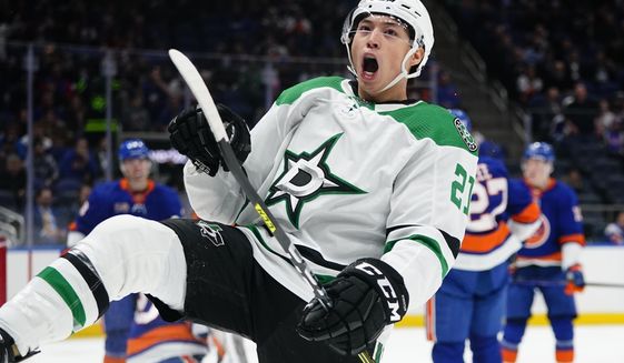Dallas Stars&#x27; Jason Robertson celebrates after scoring a goal during the first period of an NHL hockey game against the New York Islanders Tuesday, Jan. 10, 2023, in Elmont, N.Y. (AP Photo/Frank Franklin II)